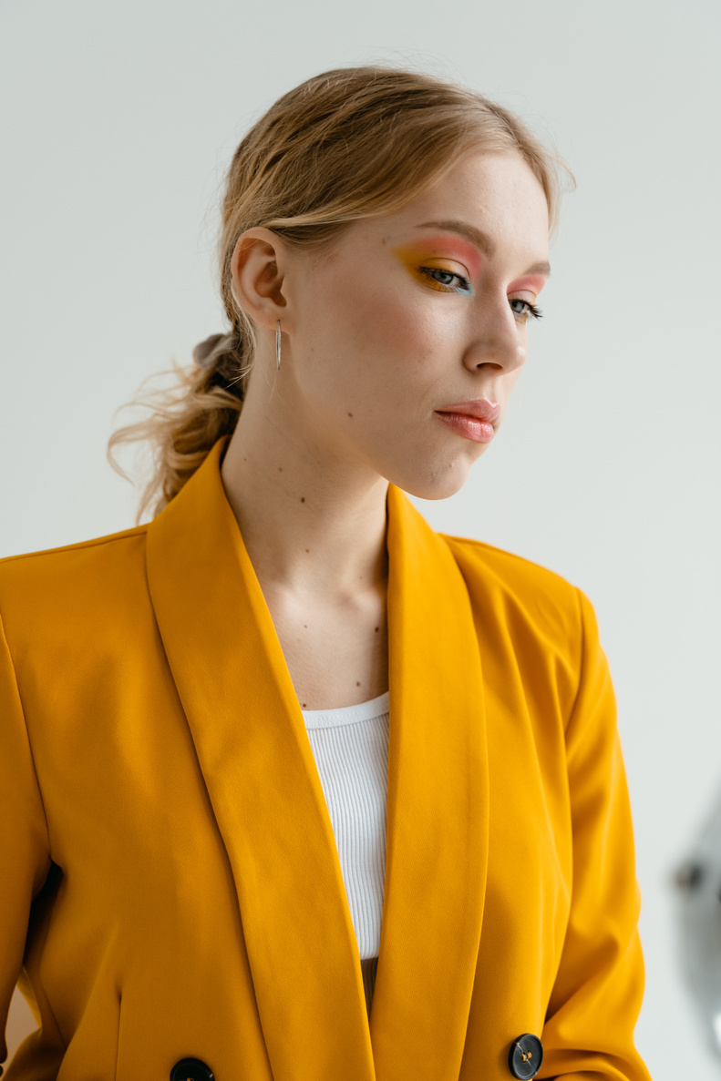 Woman in Yellow Blazer with Pink and Orange Eyeshadows